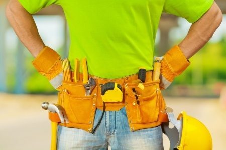21687155 - tools in belt of worker